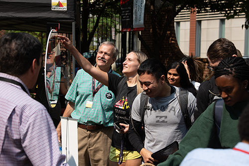 Staff and students spin the wheel to get prizes