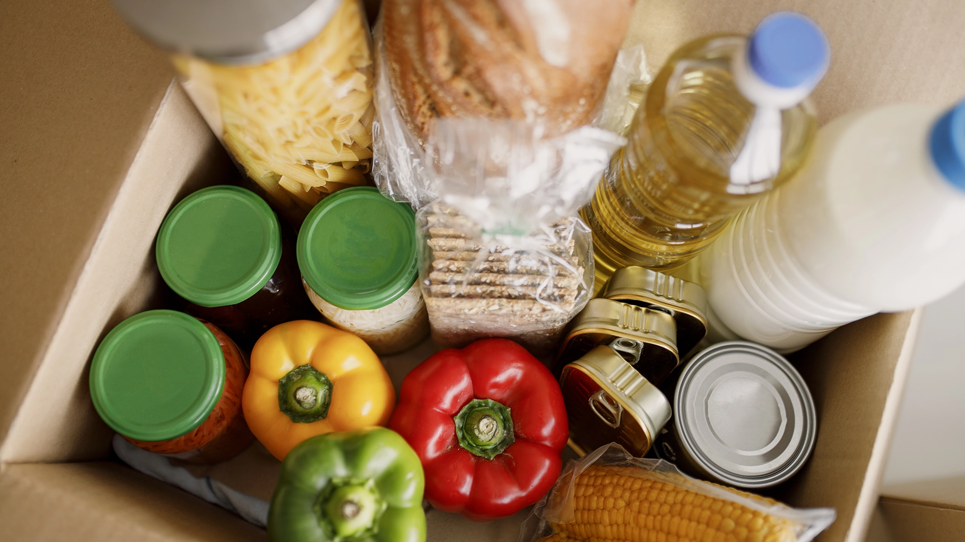 Food donations box full of groceries