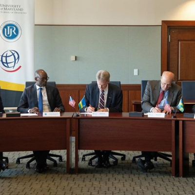 Dr. Jarrell and other officials sign a memorandum of understanding for Operation Smile in Rwanda