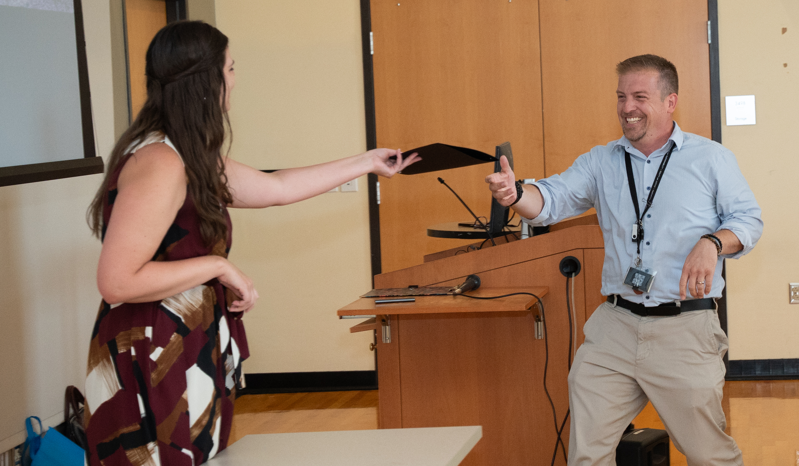 Eric Getting a Certificate at the Emerging Leaders Ceremony