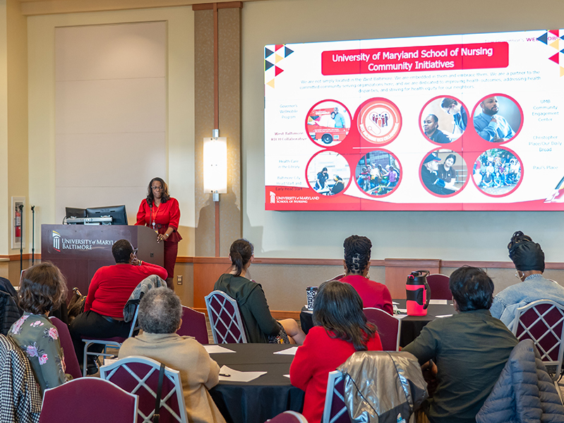 Group of attendees listening to presentation by SON Dean Yolanda Ogbulu