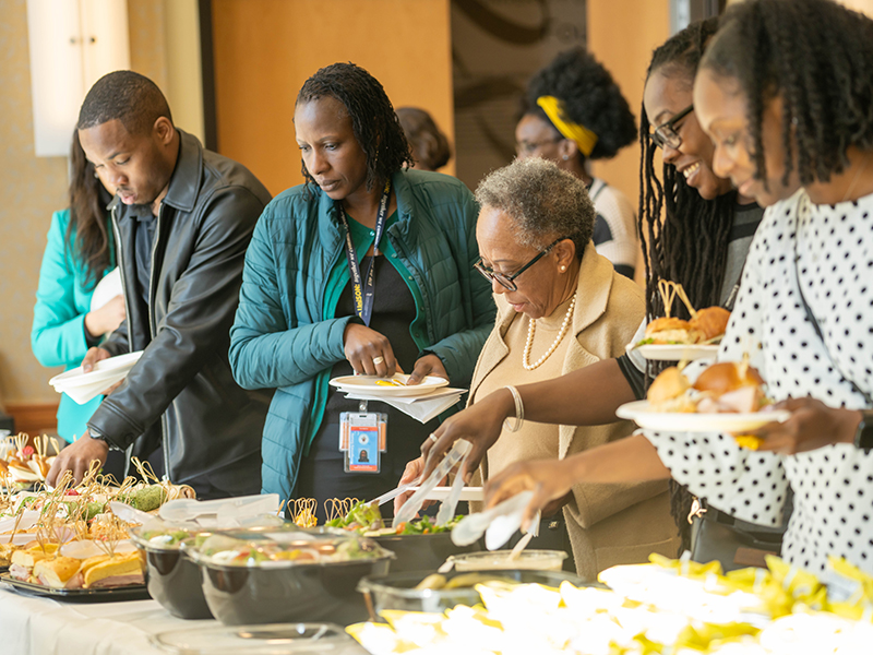 Group of people in a food line