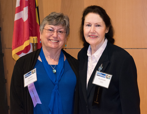 Judy Ozbolt (left), honored for her 46-year career in nursing informatics, appears with SINI conference co-chair Mary Etta Mills.