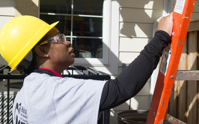 Chrishna Williams of the University of Maryland School of Social Work volunteers during a Team Build for Habitat for Humanity of the Chesapeake. 