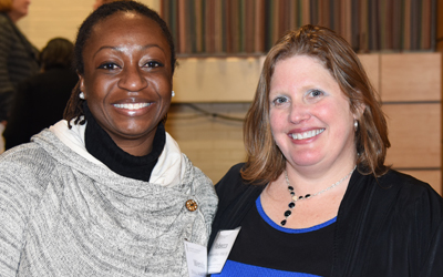 Wendy Shaia, MSW,'01, left, executive director, Social Work Community Outreach Service, and Rebecca Bowman-Rivas, MSW '99, LCSW-C, program manager, the Law and Social Work Services Program, University of Maryland Francis King Carey School of Law, participated in the University of Maryland School of Social Work's 11th Annual Homecoming on March 3.