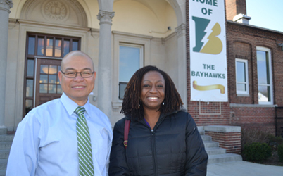 Dante DeTablan, MSW, and Wendy Shaia, EdD, MSW of the UM SSW Social Work Community Service at Ben Franklin High School/Masonville Cove in 2014.