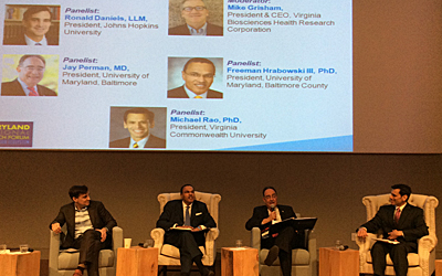 UMB Pres. Perman appears with other university presidents on a panel at 2015 Maryland Regional BioTech Forum.