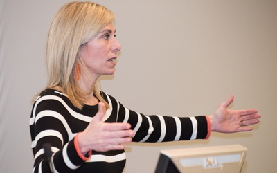 Suzanne Sysko Clough, MD, speaks at the President’s Symposium & White Paper Project event on Feb. 9.