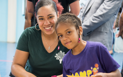 Promise Heights staffer and camper at the newly reopened Crispus Attucks Recreation Center.