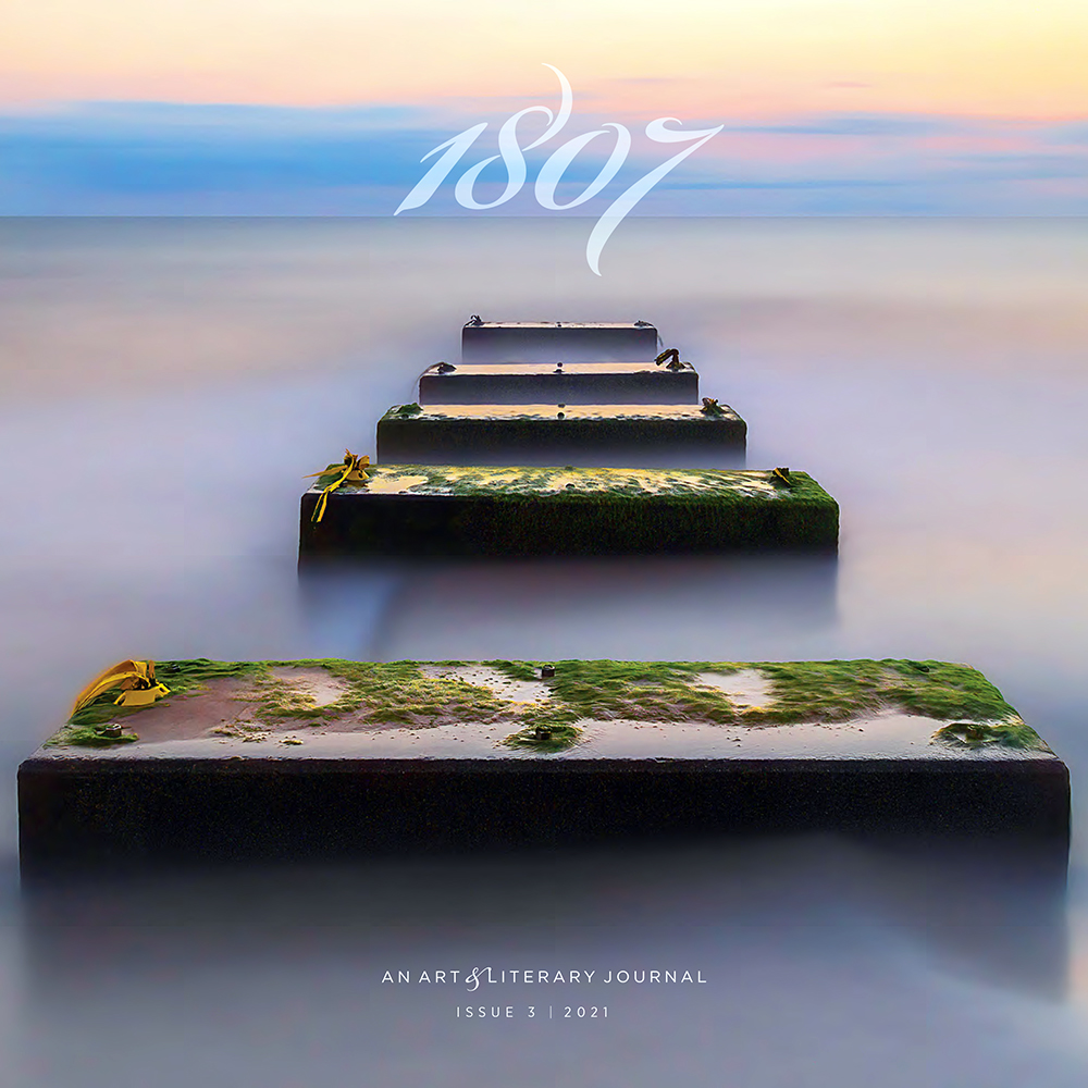 The cover of 1807 Issue 3. Features “Tranquil Morning,” a photograph by University of Maryland, Baltimore alumnus Christopher Frisone, MSN. The photograph depicts an ethereal sunrise image of what remains of a pier near Nags Head, N.C.